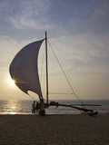 Fisherman and Oruvas (Traditional Outrigger Dug-Out Canoe)  on Negombo Beach  Sri Lanka  Asia