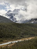Snow-Covered Mountains Among Clouds  Banff Nat'l Park  UNESCO World Heritage Site  Alberta  Canada