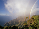 An Iridescent Double Rainbow Arcs over the Kalalau Valley