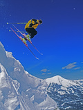 A Skier Jumps a Cornice at Exclusive Yellowstone Club Ski Area  Montana