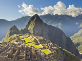 Sun Shining Through the Andes Mountains onto Machu Picchu at Sunset