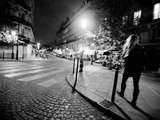 A Woman Walking at Night