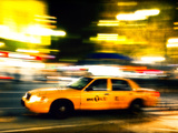 A NY Taxi Cab Rushes By