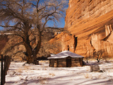 A Navajo Hogan at the Base of the Canyon De Chelly Cliffs