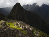 Sunlight Strikes Machu Picchu Through a Break in the Clouds