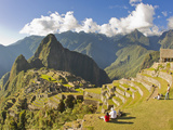 Tourists Enjoying a View of Machu Picchu During Sunset