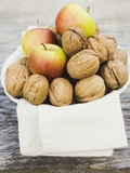 Walnuts and Apples on Cloth in White Bowl