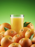 Orange Juice and Fresh Oranges