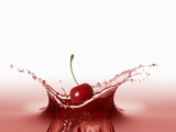 A Cherry Falling into Red Juice