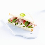 A Ham  Camembert  Tomato  Cucumber and Basil Sandwich