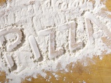 The Word 'PIZZA' Written in Flour