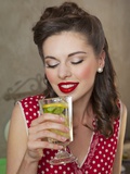 A Retro-Style Girl Drinking Lemonade