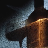 Shadow of Glass of Wine and Wine Bottle on Wall