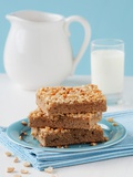 Three Slices of Peanut Cake Tray Bake on a Plate
