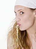 Young Woman Sucking Spaghetti