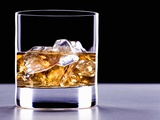 A Glass of Whisky with Ice Cubes