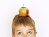 Small Boy with Apple on His Head