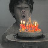 A Boy with a Birthday Cake
