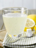 Hot Lemon with Sugar Cubes  Lemons in Background
