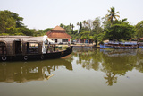 Traditional Kettuvallom (Private Houseboat) Travelling Along the Kerala Backwaters  Kerala  India