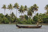 Fisherman in Traditional Boat on the Kerala Backwaters  Kerala  India  Asia