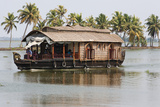 Traditional Kettuvallom (Private Houseboat) Travelling Along the Kerala Backwaters  Kerala  India