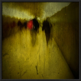 People Walking Along a Tunnel
