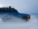 Travelers Drive over a Flooded Salt Flat in Bolivia