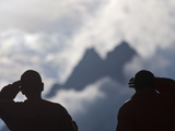 Buddhist Monks Shield their Eyes