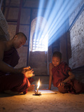 Two Novice Monks Reading Buddhist Texts Inside a Pagoda at Bagan in the Country of Burma (Myanmar)