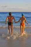 Romance  Couple Running into the Water on the Beach  Bohol Island  Philippines