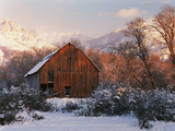 Barn Below Bear River Range in Winter  Utah  USA