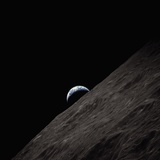 Crescent Earth Rising Behind the Moon